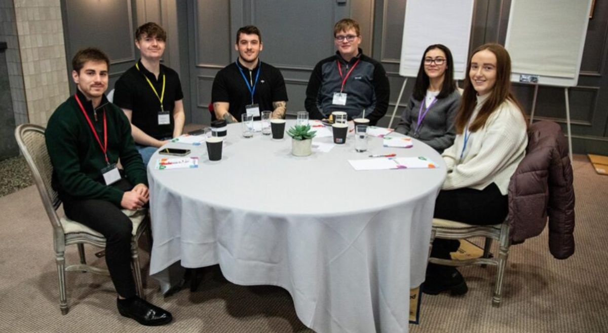 A picture of SERC Business Students sitting around a table during the Economic Development Conference